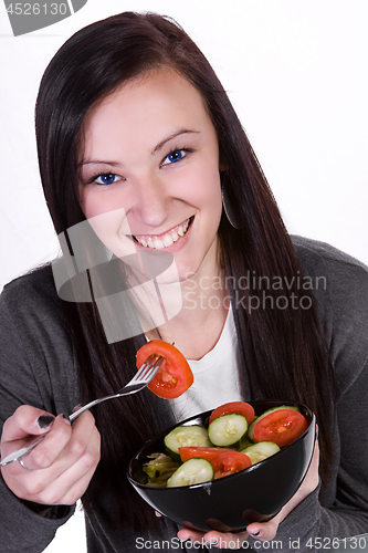 Image of Beautiful Girl Eating Salad