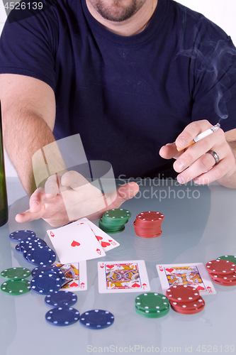 Image of Man Going all in with Royal Flush