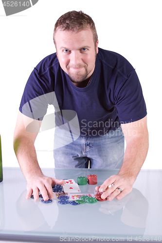 Image of Man with a Royal Flush Taking his Winings