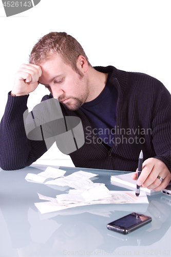 Image of Young Casual Businessman Working at his Desk