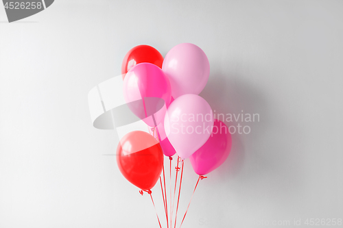 Image of pink and red air balloons for birthday party