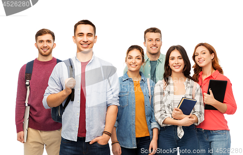 Image of group of smiling students with books