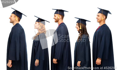 Image of graduates in mortar boards and bachelor gowns