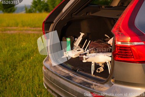 Image of drone ready for fly in suv trunk l