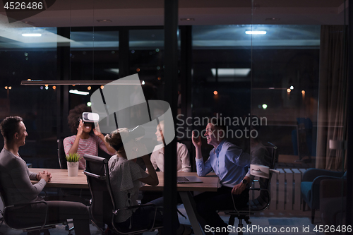 Image of Multiethnic Business team using virtual reality headset