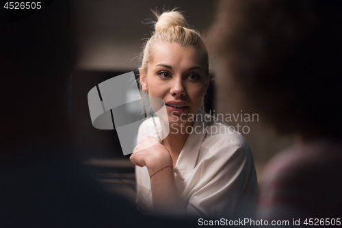 Image of Multiethnic startup business team in night office