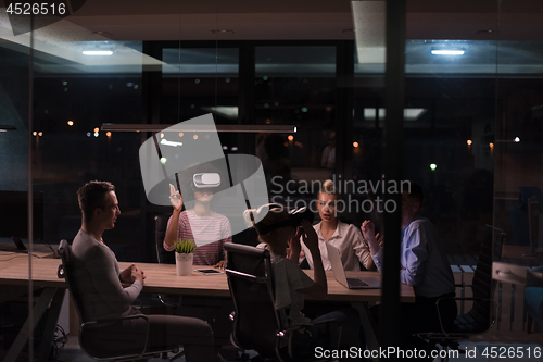 Image of Multiethnic Business team using virtual reality headset