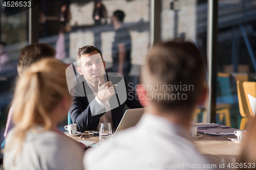 Image of Business Team At A Meeting at modern office building