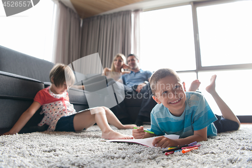 Image of young couple spending time with kids