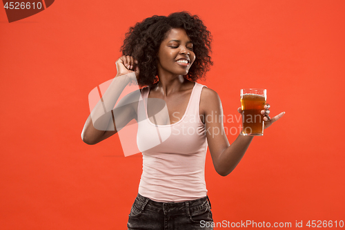 Image of Sexy young afro woman drinking beer, not isolated on white background