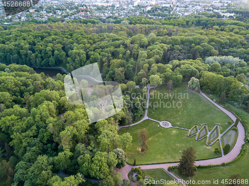 Image of Aerial panoramic view from the drone to the national dendrological park Sofiyivka in city Uman, Ukraine in the summer at sunset