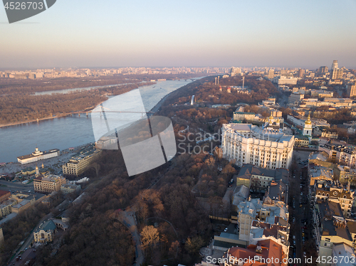 Image of Panoramic view of Kiev, the Dnieper River and Podol district in April. Kiev, Ukraine. Drone photography