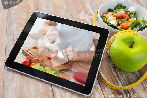 Image of tutorial cooking video on tablet computer