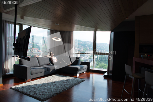 Image of woman using tablet in beautiful apartment