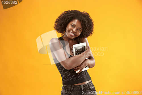 Image of The happy businesswoman with laptop