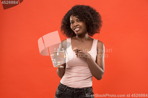 Image of Sexy young afro woman drinking beer, not isolated on white background