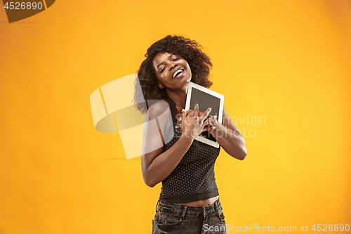 Image of The happy businesswoman with laptop