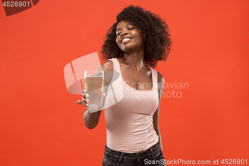Image of Sexy young afro woman drinking beer, not isolated on white background