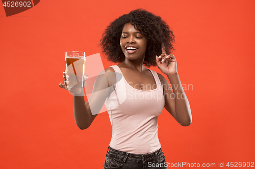 Image of Sexy young afro woman drinking beer, not isolated on white background