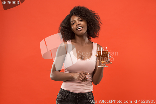 Image of Sexy young afro woman drinking beer, not isolated on white background