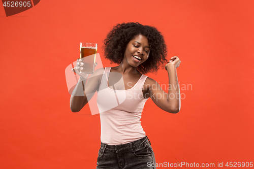 Image of Sexy young afro woman drinking beer, not isolated on white background