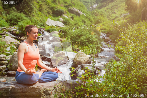 Image of Woman in Padmasana outdoors