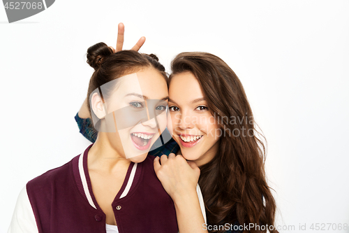 Image of happy smiling teenage girls over white background