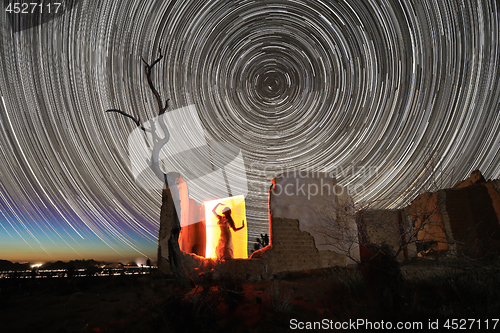 Image of Person Light Painted in the Desert Under the Night Sky