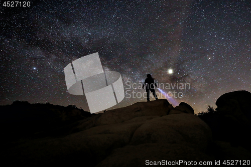 Image of Person Light Painted in the Desert Under the Night Sky