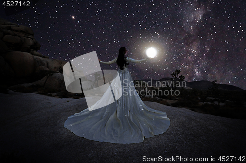 Image of Person Light Painted in the Desert Under the Night Sky