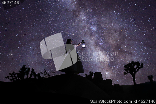 Image of Person Light Painted in the Desert Under the Night Sky