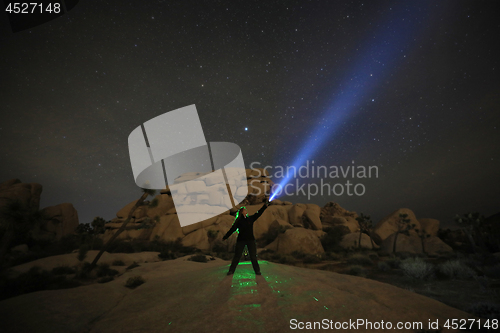 Image of Person Light Painted in the Desert Under the Night Sky