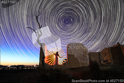 Image of Person Light Painted in the Desert Under the Night Sky