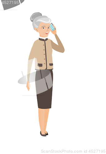Image of Caucasian business woman talking on a mobile phone