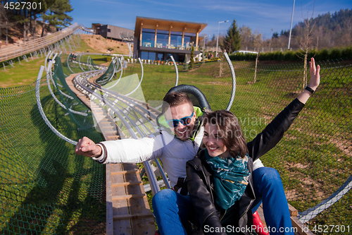 Image of couple driving on alpine coaster