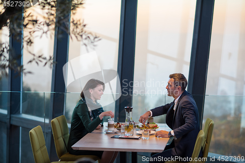 Image of loving couple enjoying romantic dinner