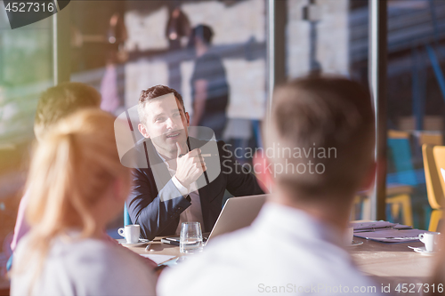 Image of young business team on meeting at office