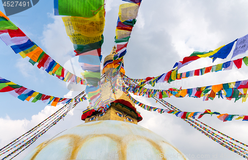 Image of Boudhanath Stupa and prayer flags in Kathmandu