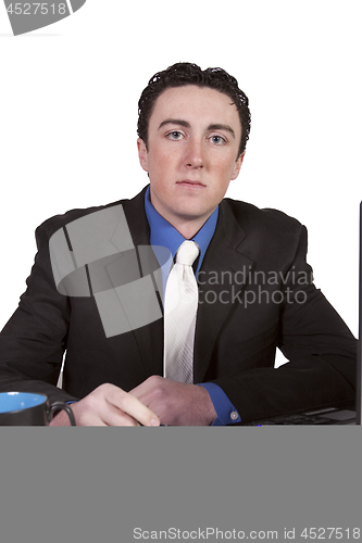 Image of Businessman at His Desk Working