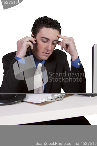 Image of Businessman at His Desk Working