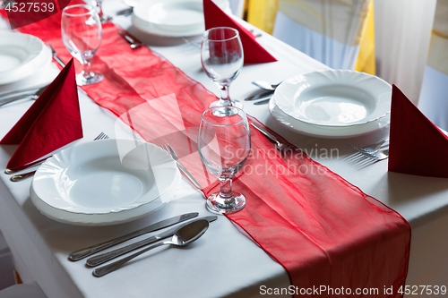 Image of Large dining hall with tables set up