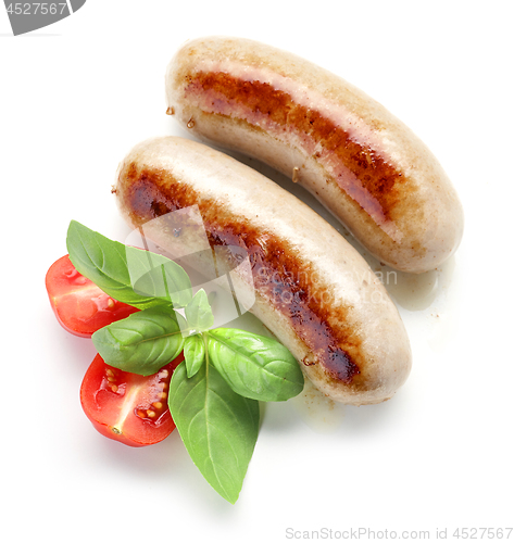 Image of grilled sausages on white background