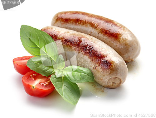 Image of grilled sausages on white background