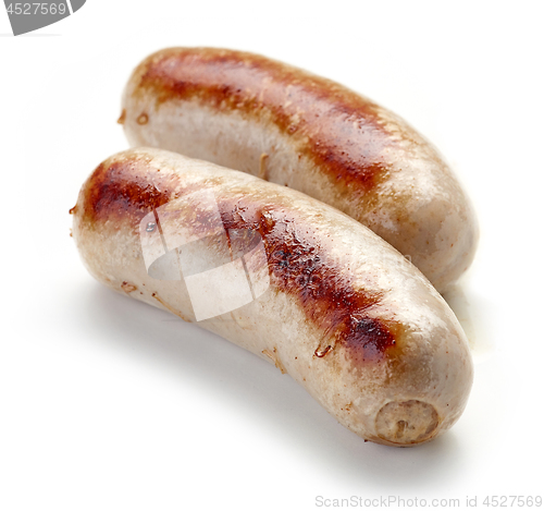 Image of grilled sausages on white background