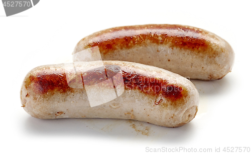 Image of grilled sausages on white background