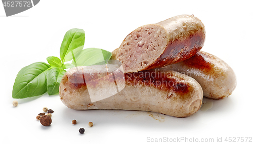 Image of grilled sausages on white background
