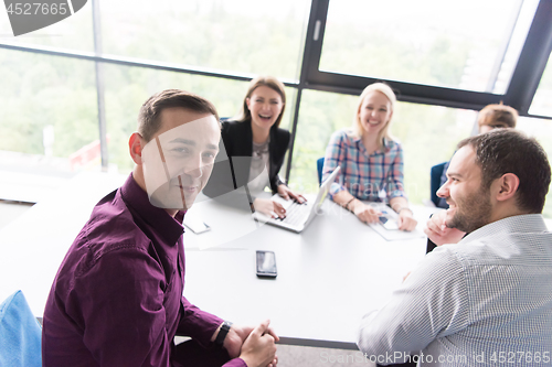 Image of Group of young people meeting in startup office