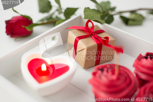 Image of close up of gift box and sweets for valentines day