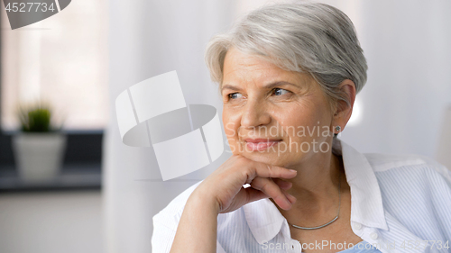 Image of portrait of pensive senior woman