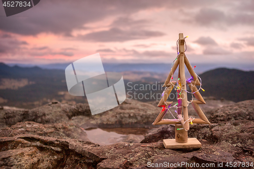 Image of Christmas Tree with mountain valley backdrop